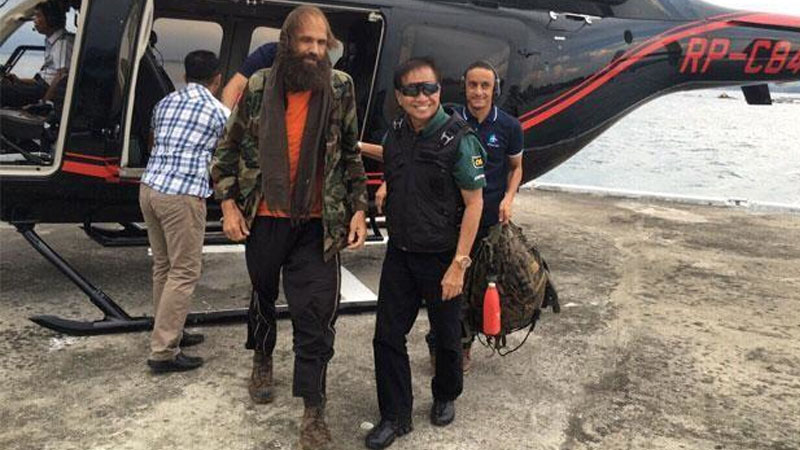 Freed Norwegian hostage in Philippines flies home