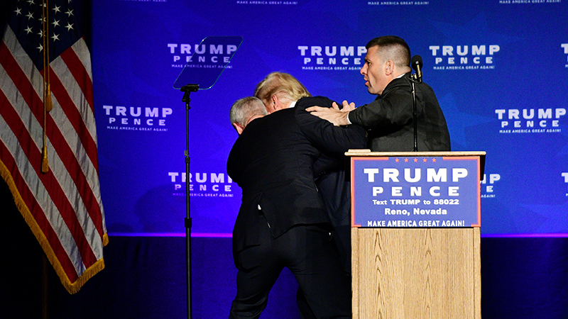 Trump rushed off stage in false gun scare