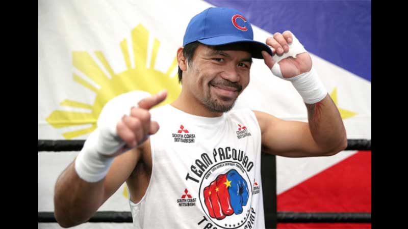 Victorious Pacquiao returns to Philippines