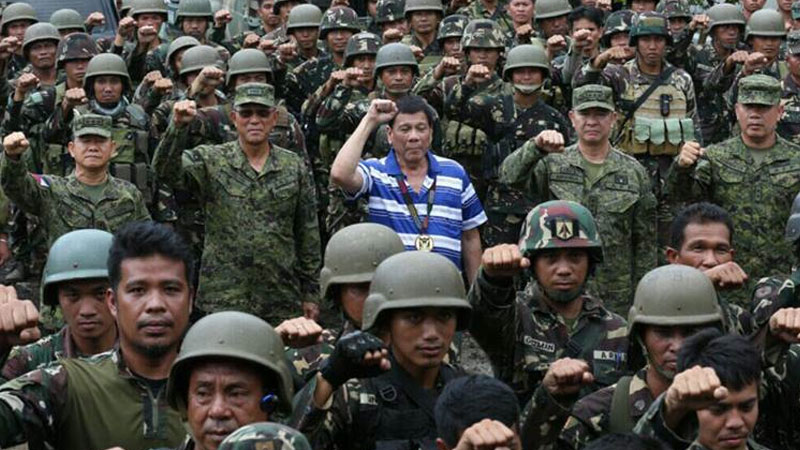 China tells Philippines to accept firearms right away