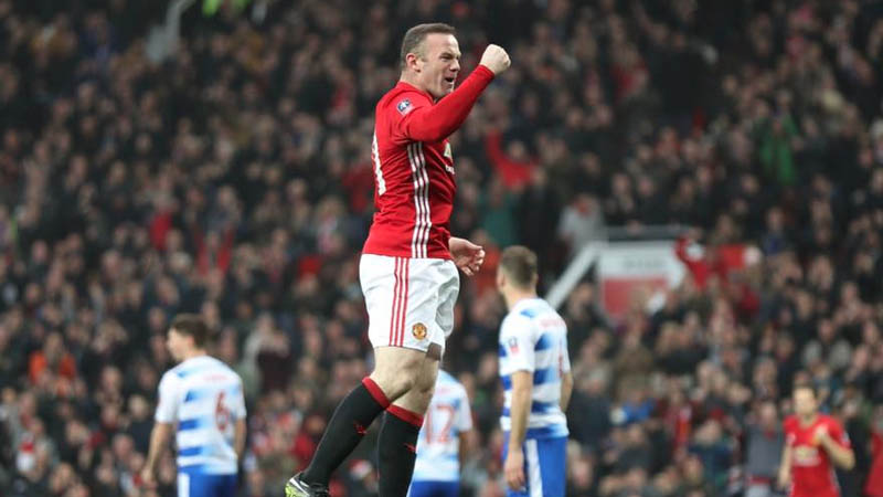 Football: Rooney equals Charlton's record