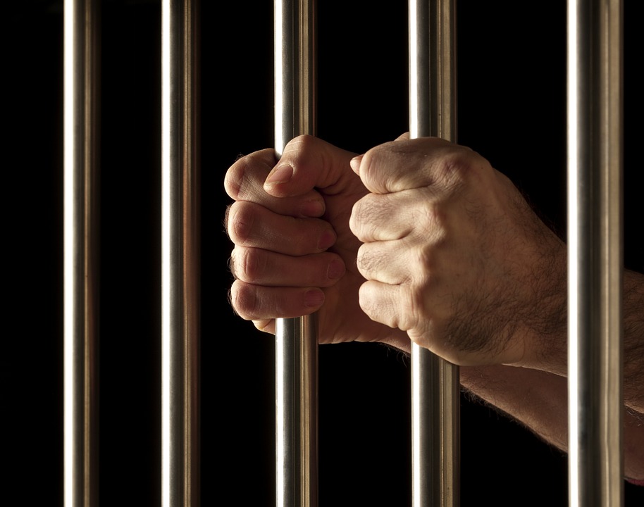 Three African robbery suspects flee police station