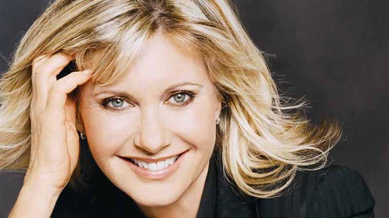 Olivia Newton-John bares 2nd bout with breast cancer