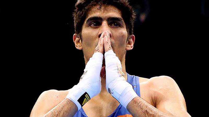 Victorious Indian boxer gives back title belt to Chinese foe