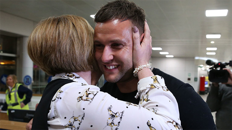 Briton 'very happy to be home' after being detained in Dubai for touching man