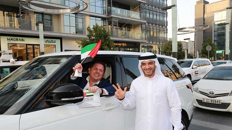 Dubai traffic police chief flags down motorists on UAE National Flag Day