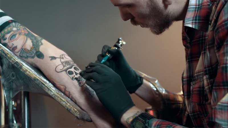 Gang arrested in raid on illegal tattoo parlour in International City