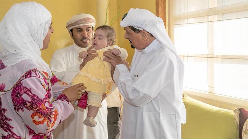Ajman ruler meets girl born with 'two heads'