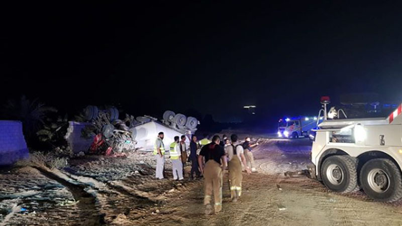 Trapped driver rescued after truck overturns in Ajman