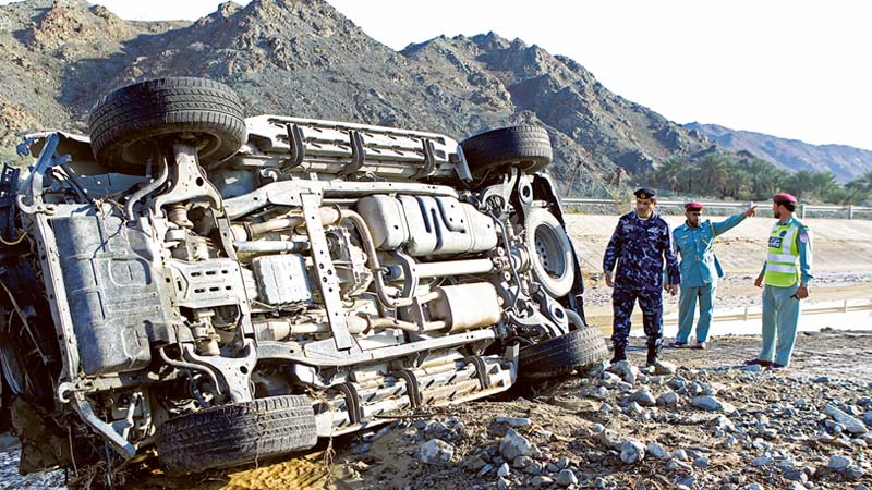 Search on for driver swept away by RAK floods