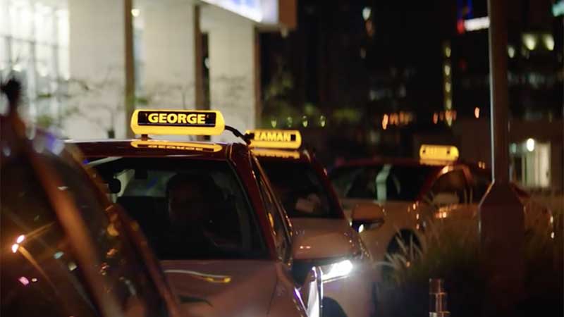 Taxi drivers in Dubai have names displayed on roof lights