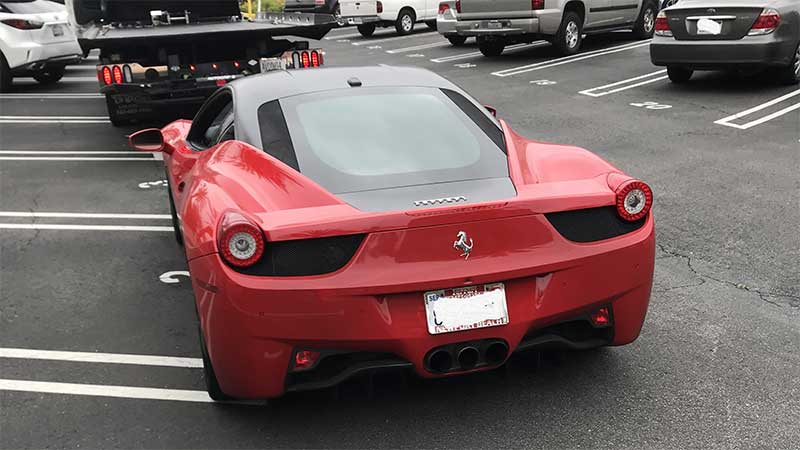Man charged with using $5 million Covid-19 relief loans to buy Ferrari