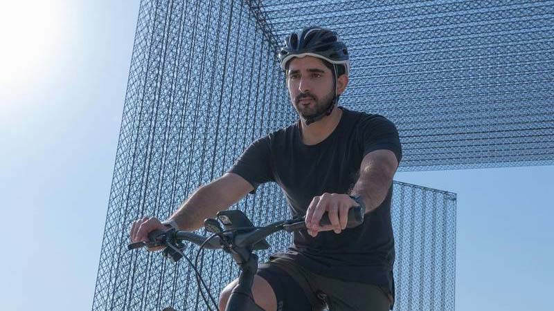 Sheikh Hamdan tours Expo 2020 Dubai on bicycle