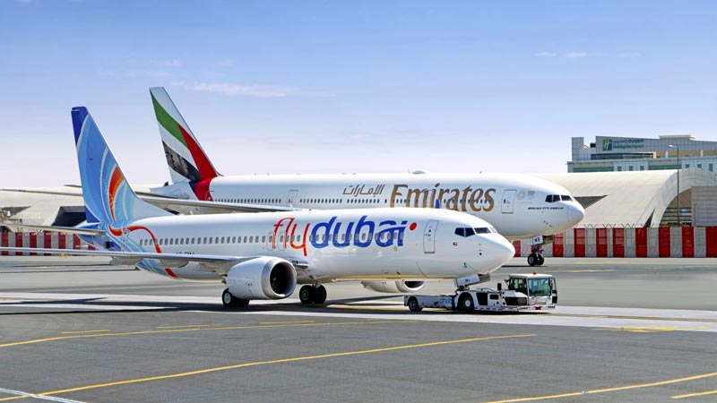 Flydubai and emirates planes at Dubai International Airport