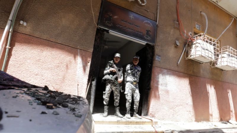 Egypt mourns 41 killed in Giza Coptic church fire
