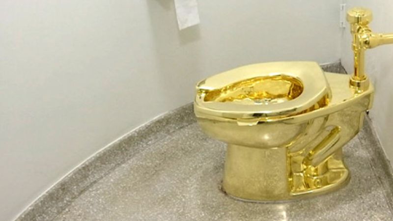 4 charged with theft of gold toilet worth $5.9 million