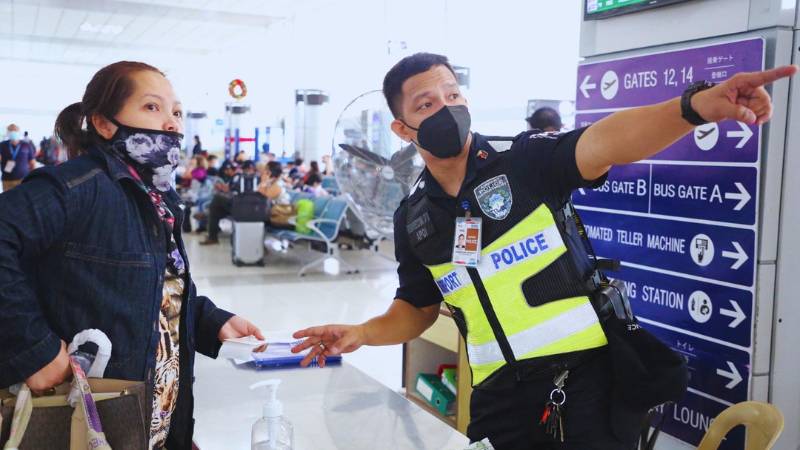 Philippines bans airport security personnel from touching passports