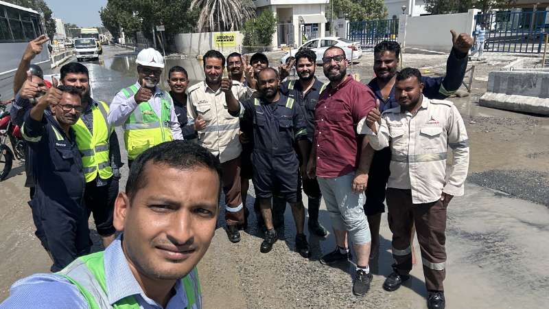 Dubai rain aftermath: Mechanics help clear vehicles stuck on flooded road