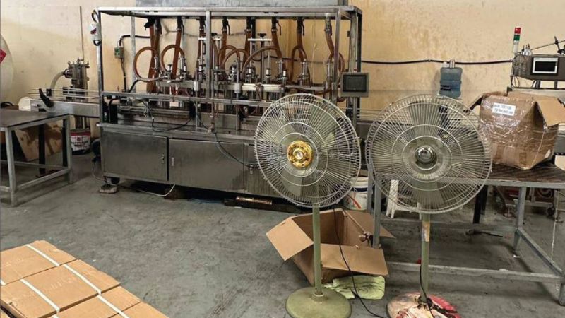 Ajman police raids secret warehouse for fake car lubricants, arrests suspect