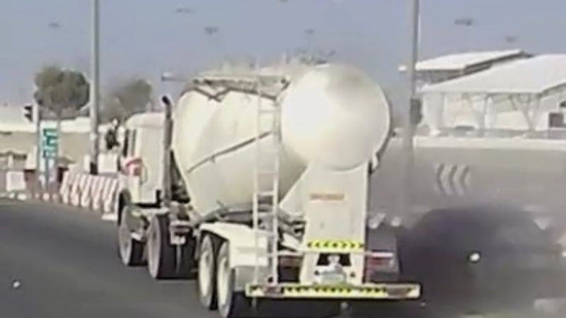 WATCH: Truck driver runs red light in Dubai, drags another car onto pavement
