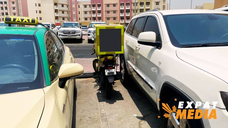 Delivery motorcycle riders in Dubai under fire for double parking, safety violations