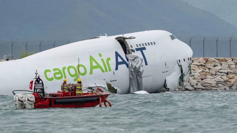 Two dead after Emirates cargo plane skids off runway in Hong Kong
