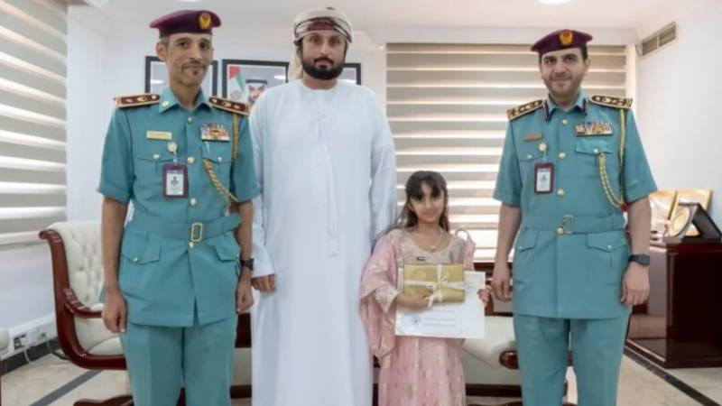 Ajman Police honour girl for returning lost money she found in public place