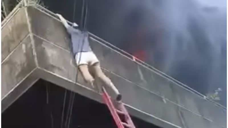 Cebu: Woman trapped in burning building praised for rescuing two dogs